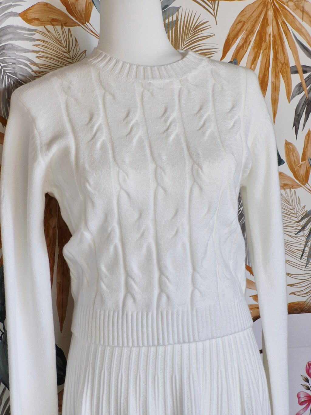Jersey de punto trenzado en color blanco