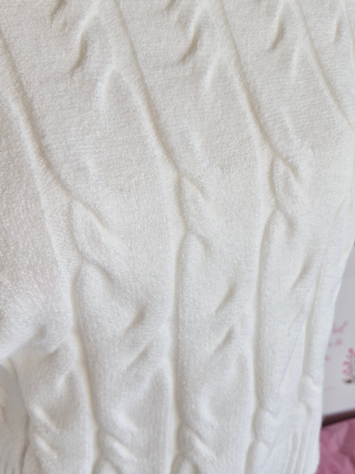 Jersey de punto trenzado en color blanco