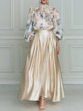 Conjunto Elegante de Blusa Floral y Falda Maxi