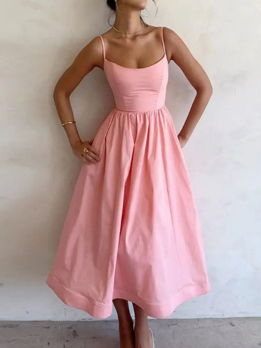 Vestido Midi Rosa con Tirantes y Falda Fluida 🌸